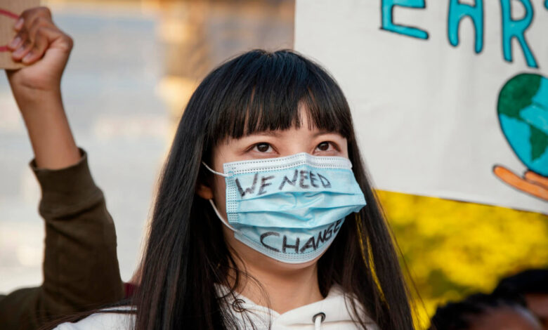 Close up activist protesting with face mask - Climate Change and Public Health: A Crisis Unfolding